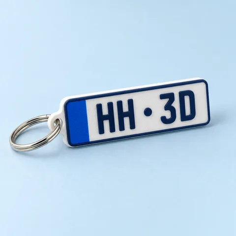 White number plate keyring with dark blue HH · 3D lettering
